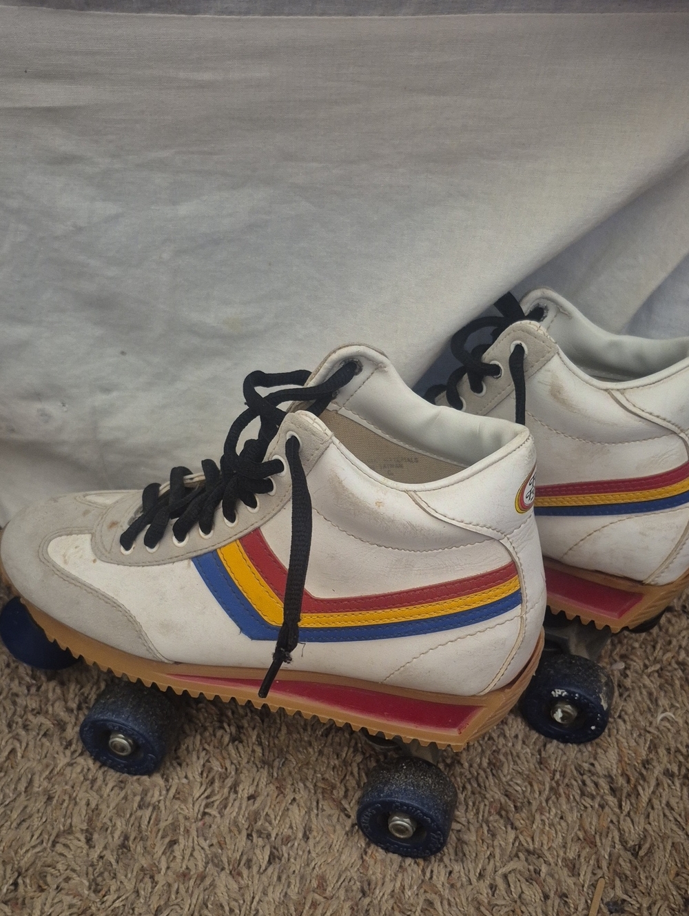 Vintage 80's White Quad Roller Skates with Red, Yellow & Blue Stripes